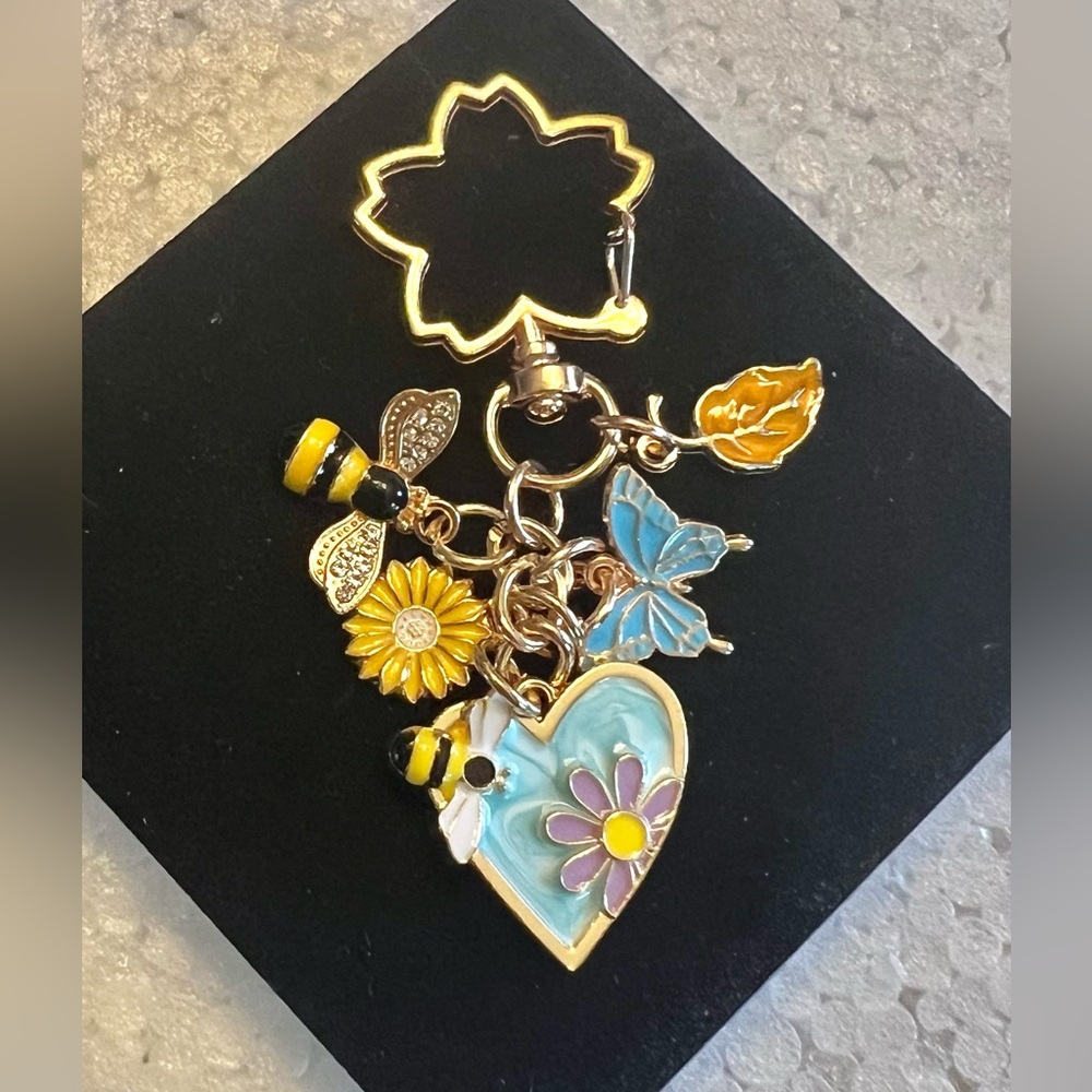 Blue floral bee bag charm